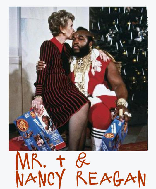 First Lady Nancy Reagan Kisses Mr.T On Forehead While Sitting On His Lap For Christmas Photo